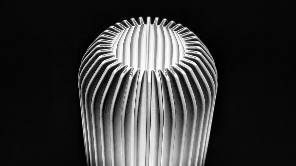 Close-up view of Kei 3D printed modern tabletop lamp highlighting sculpted spiral form